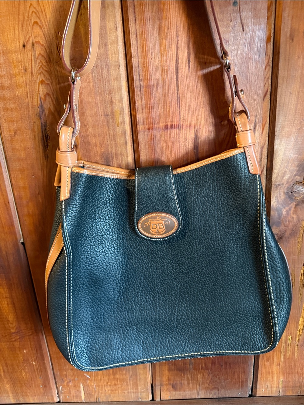 Dooney & Bourke Black Pebbled Leather Shoulder Bag with Tan Trim